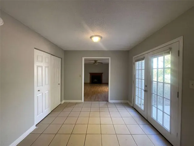 a view of an empty room and window