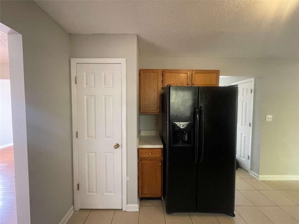 6387 Seths Way Lithonia, GA 30058 - Photo 8 of 44 a bathroom with a walk in closet and closet