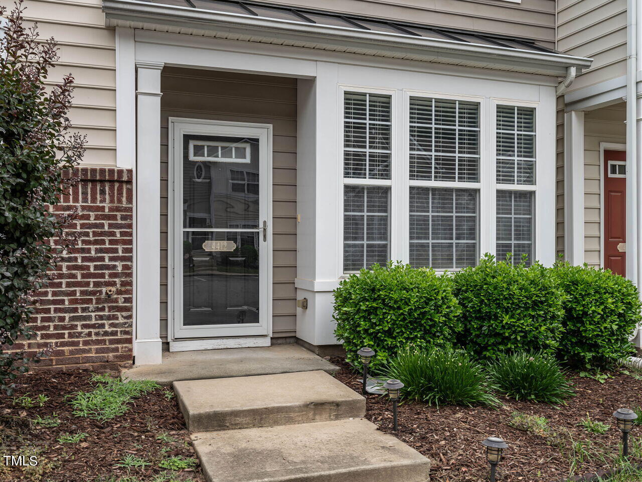 4412 Sugarbend Way Raleigh, NC 27606 - Photo 3 of 26 003-1280x960-front-porch