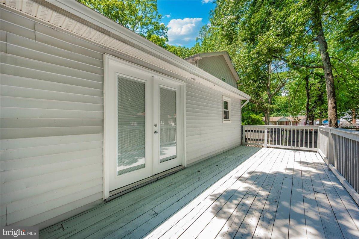 12284 Bandera Lane Lusby, MD 20657 - Photo 44 of 55 a view of backyard with a deck