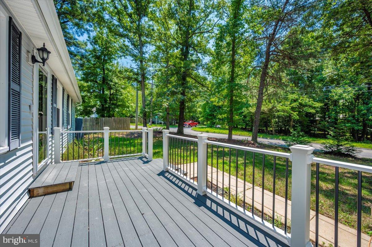 12284 Bandera Lane Lusby, MD 20657 - Photo 55 of 55 a view of balcony with deck and wooden floor