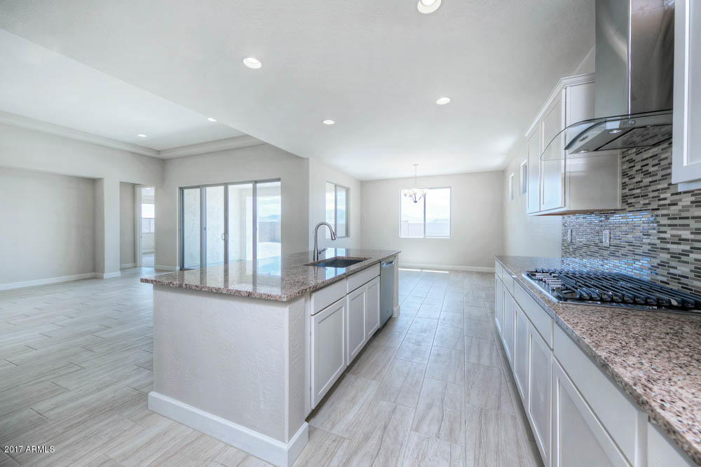 18281 West Raven Road Goodyear, AZ 85338 - Photo 4 of 23 LGI_Homes_EMR_Havasu_C-Right (4 of 9)