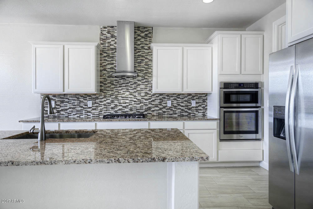 18281 West Raven Road Goodyear, AZ 85338 - Photo 5 of 23 LGI_Homes_EMR_Havasu_C-Right (5 of 9)