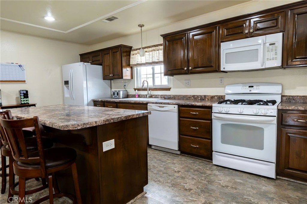 1050 West Cedar Street Willows, CA 95988 - Photo 8 of 39 Spacious kitchen with island/breakfast bar