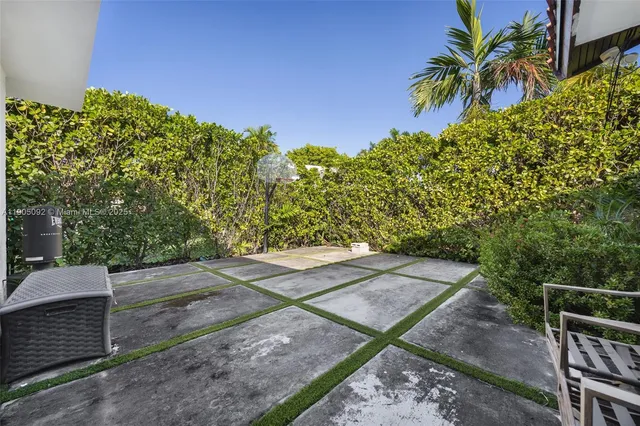 a house with a tree in front of it