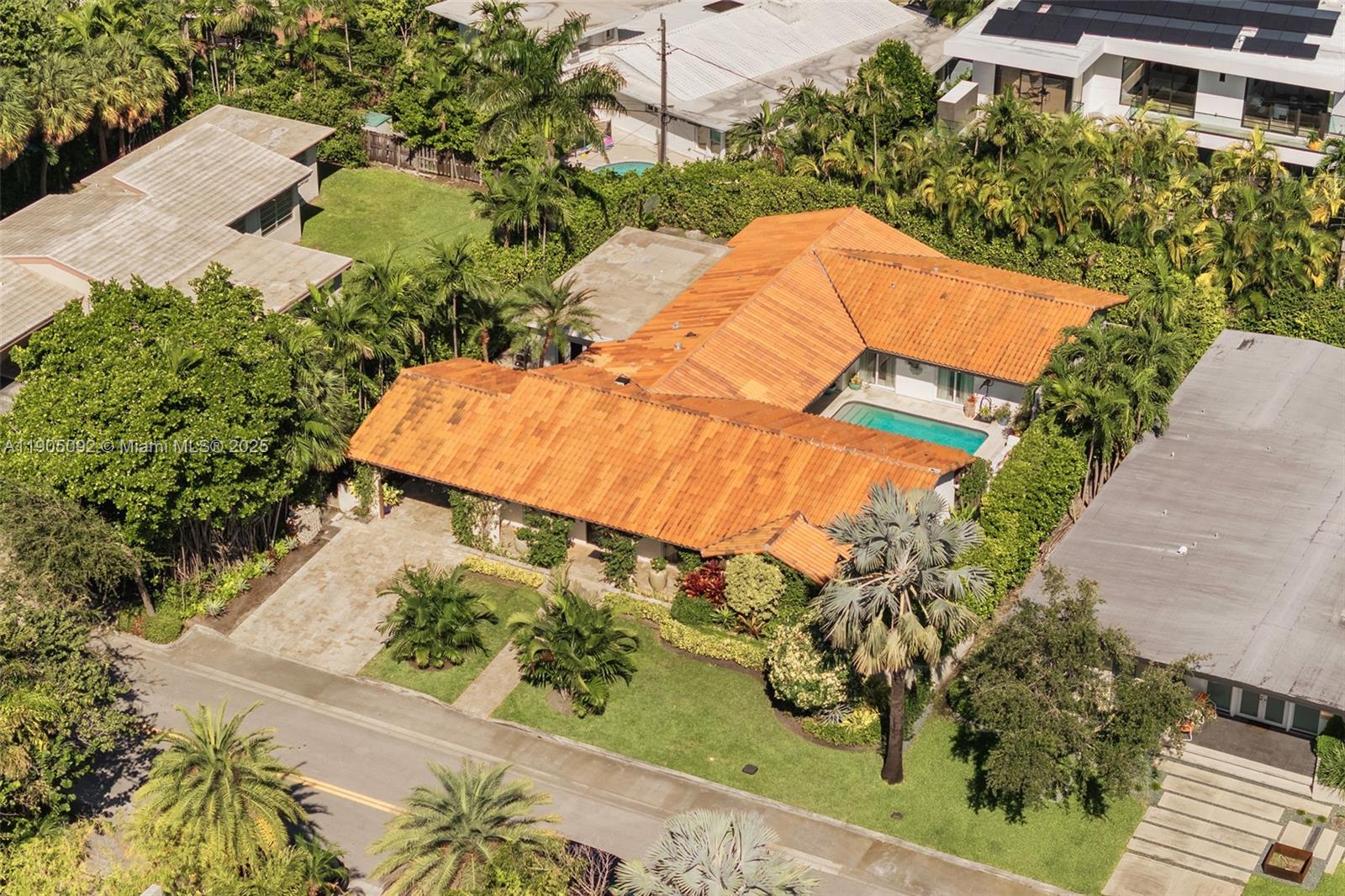 1233 102nd Street Bay Harbor Islands, FL 33154 - Photo 47 of 52 an aerial view of a house with a yard