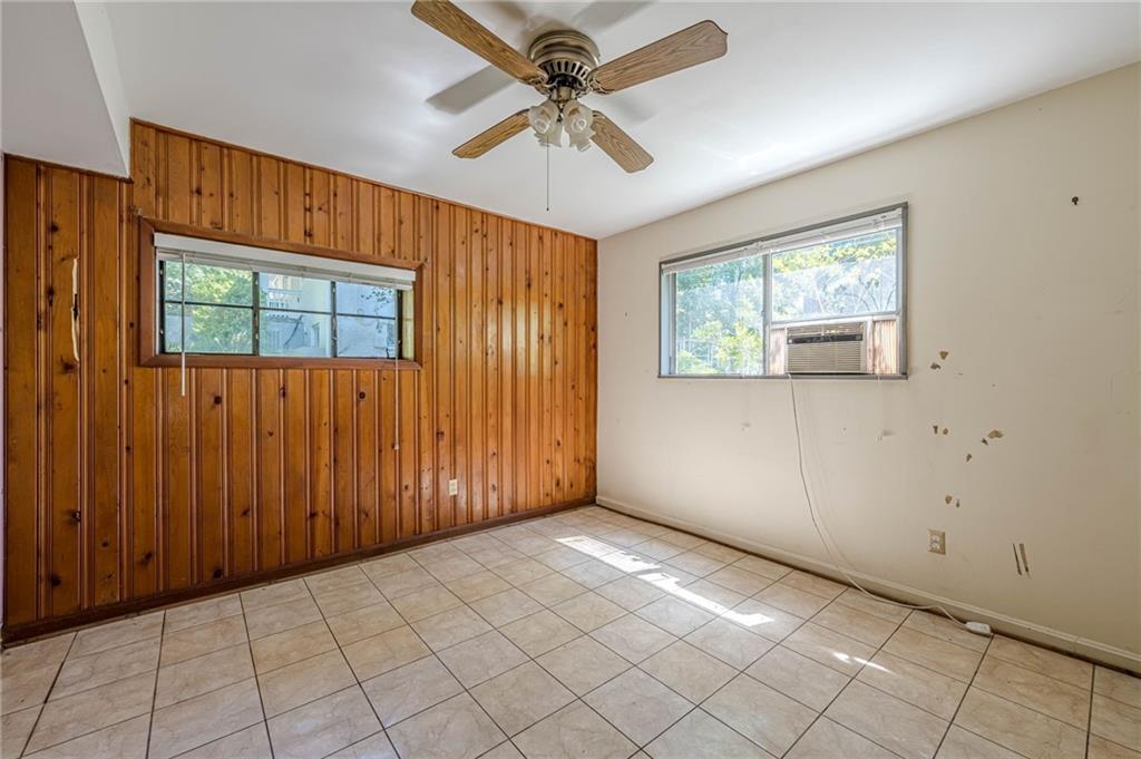 1502 North Druid Hills Road Brookhaven, GA 30319 - Photo 27 of 46 a view of an empty room with a window