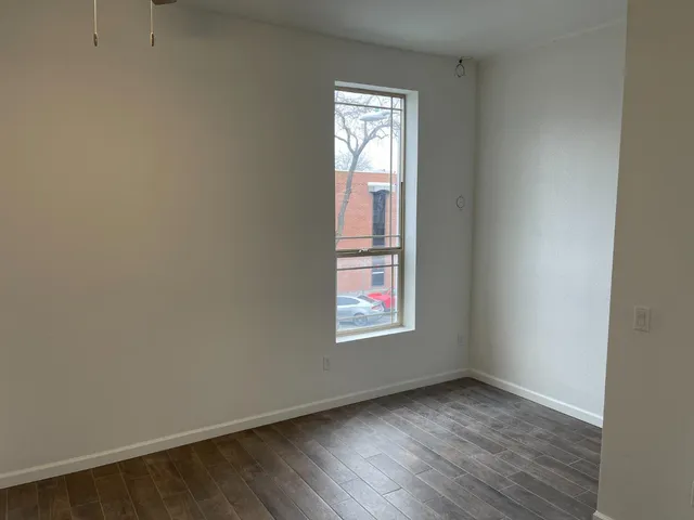 a view of an empty room and window