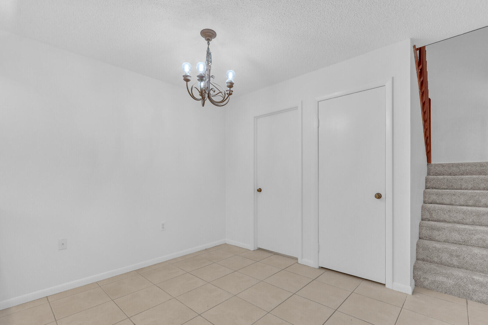 3061 30th Court Jupiter, FL 33477 - Photo 17 of 40 a view of empty room with wooden floor