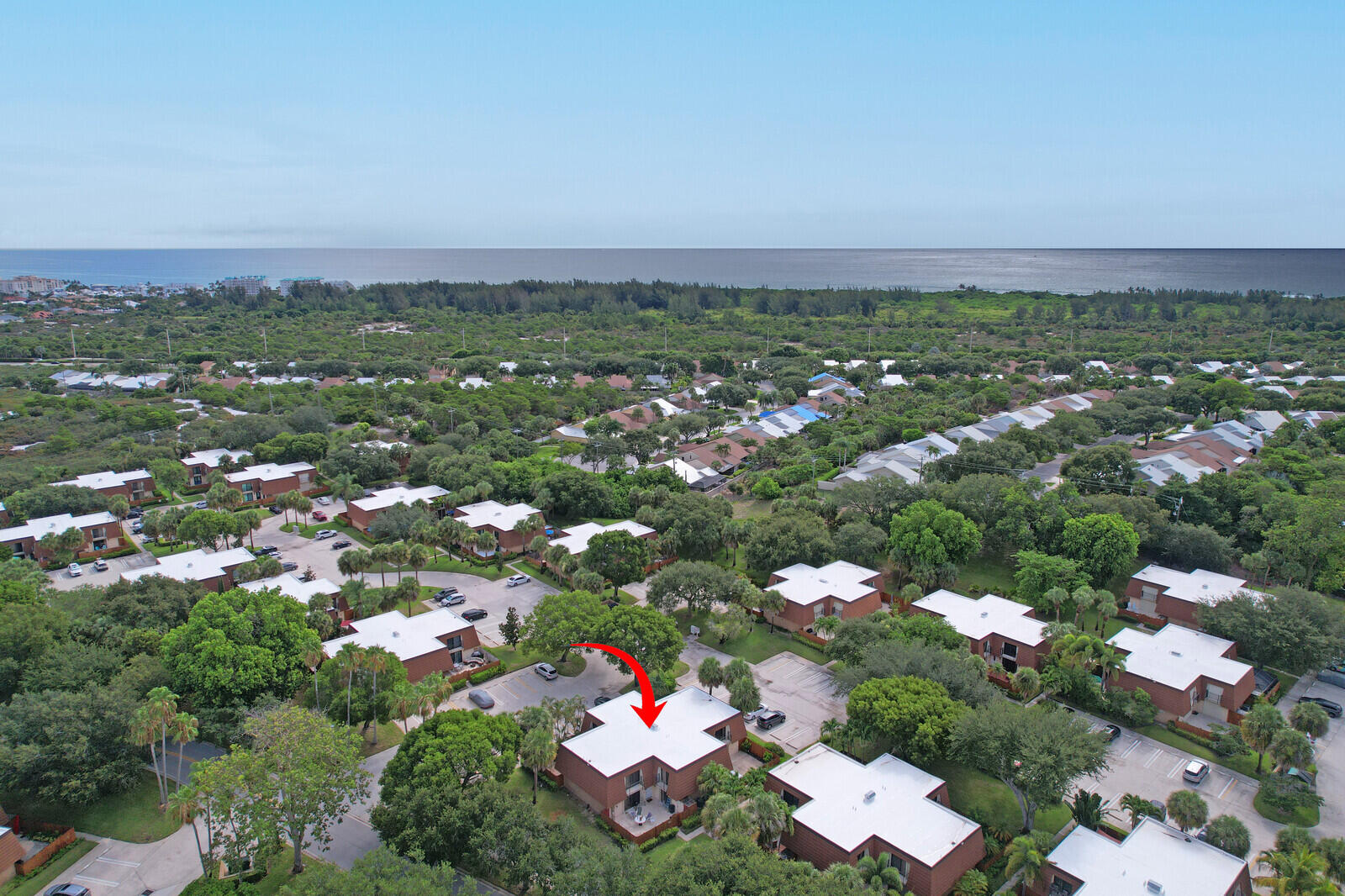 3061 30th Court Jupiter, FL 33477 - Photo 2 of 40 a city view with tall buildings