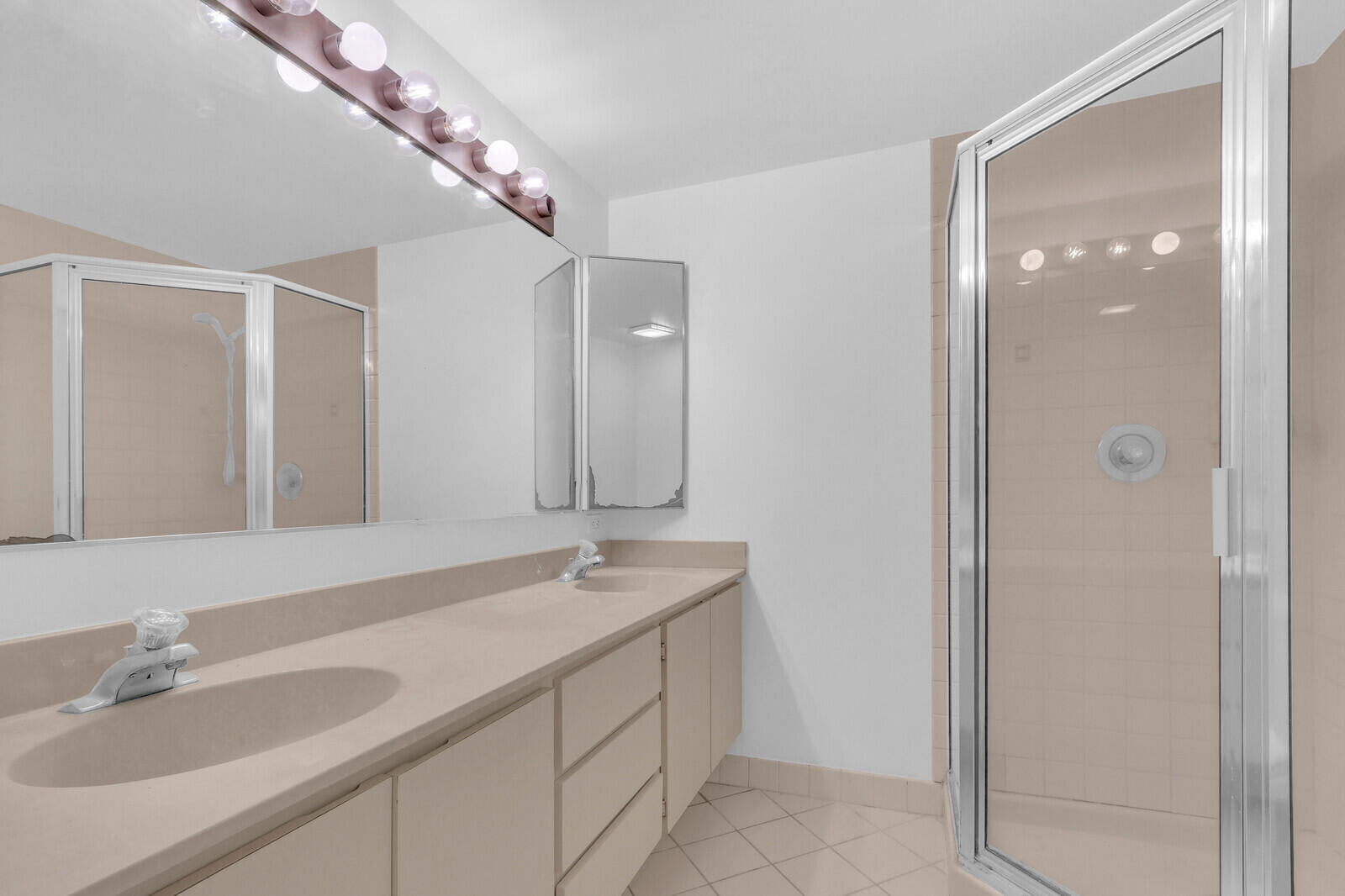 3061 30th Court Jupiter, FL 33477 - Photo 22 of 40 a bathroom with a sink and a mirror