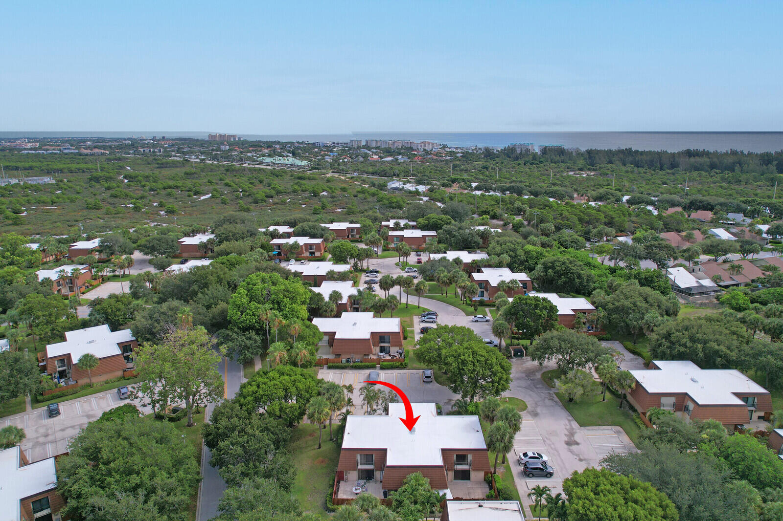 3061 30th Court Jupiter, FL 33477 - Photo 27 of 40 an aerial view of residential houses with city view