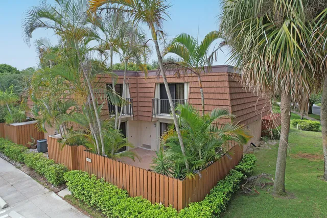 an aerial view of residential house with outdoor space