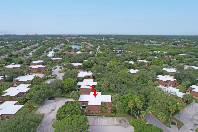 an aerial view of city and lake