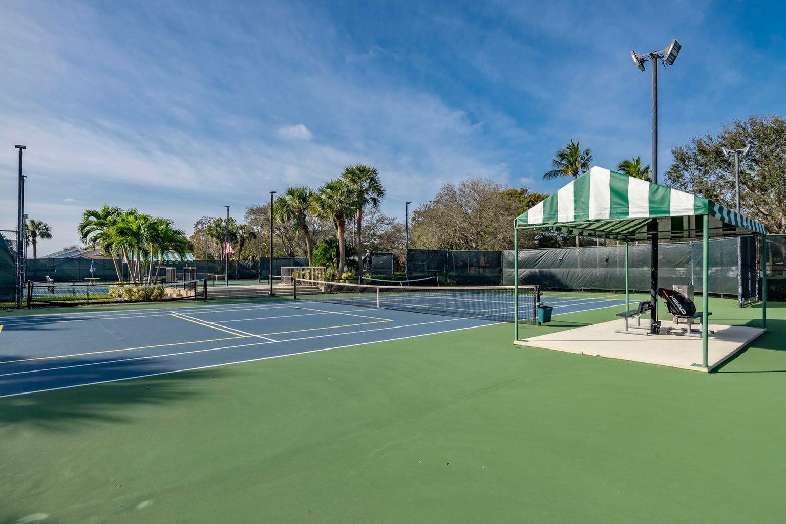 3061 30th Court Jupiter, FL 33477 - Photo 38 of 40 a view of a playground with basketball court
