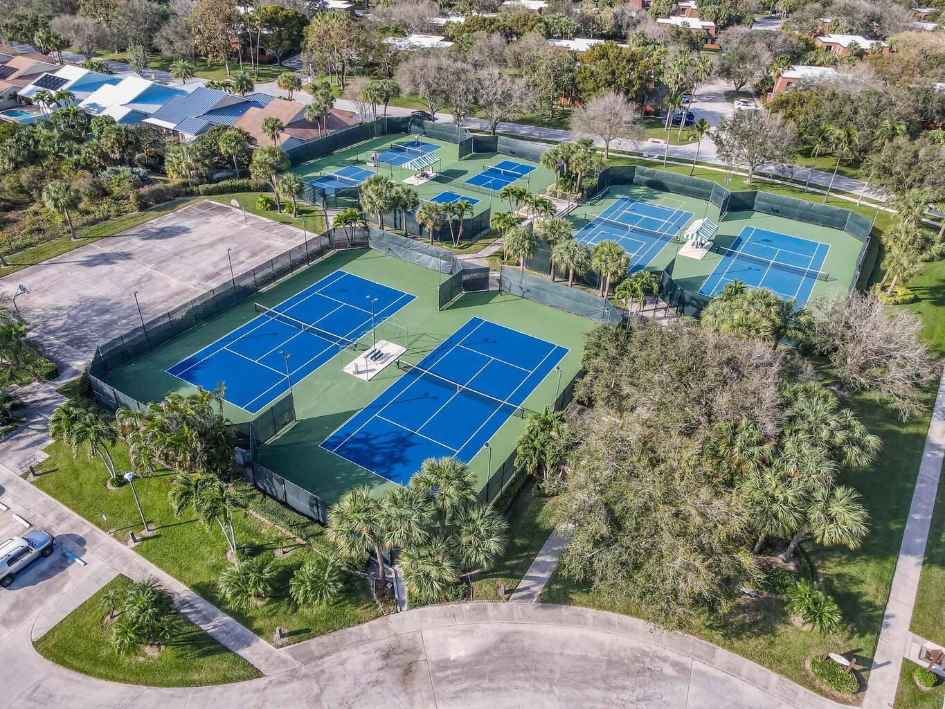 3061 30th Court Jupiter, FL 33477 - Photo 39 of 40 an aerial view of a house with a yard