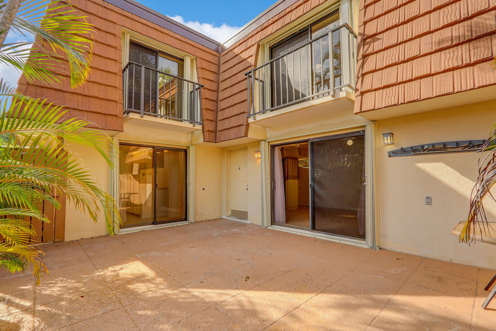 3061 30th Court Jupiter, FL 33477 - Photo 7 of 40 a view of a building with a outdoor space