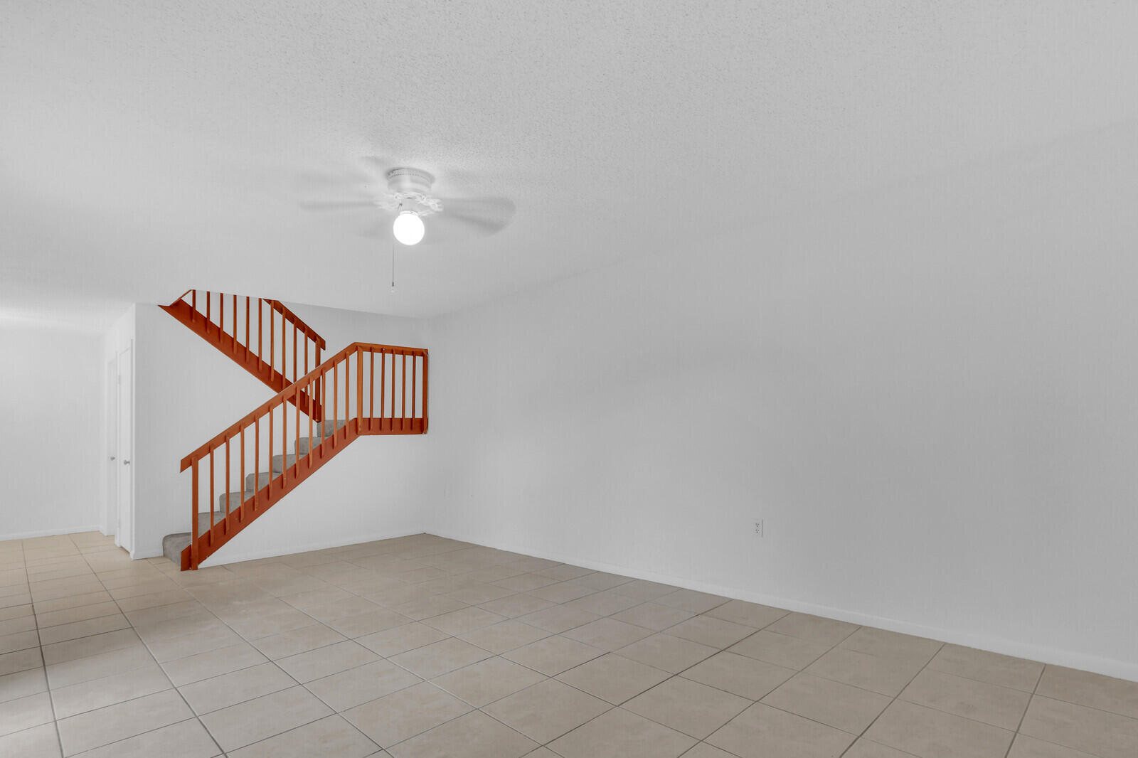 3061 30th Court Jupiter, FL 33477 - Photo 9 of 40 a view of a hallway with stairs