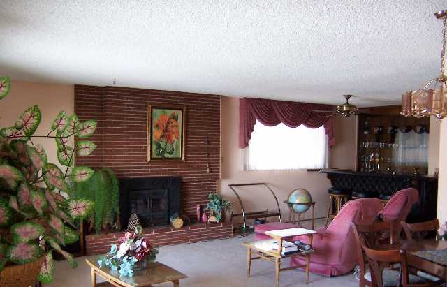3338 Menlo Court Reno, NV 89509 - Photo 2 of 5 a living room with furniture a window and a fireplace
