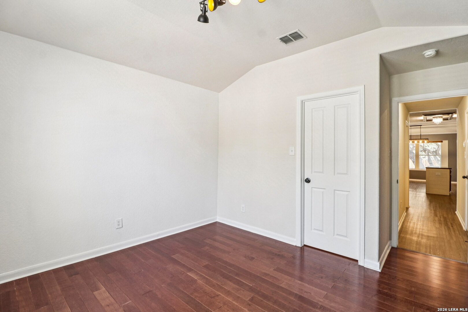 10723 Kobort Helotes, TX 78023 - Photo 19 of 36 a view of an empty room with wooden floor