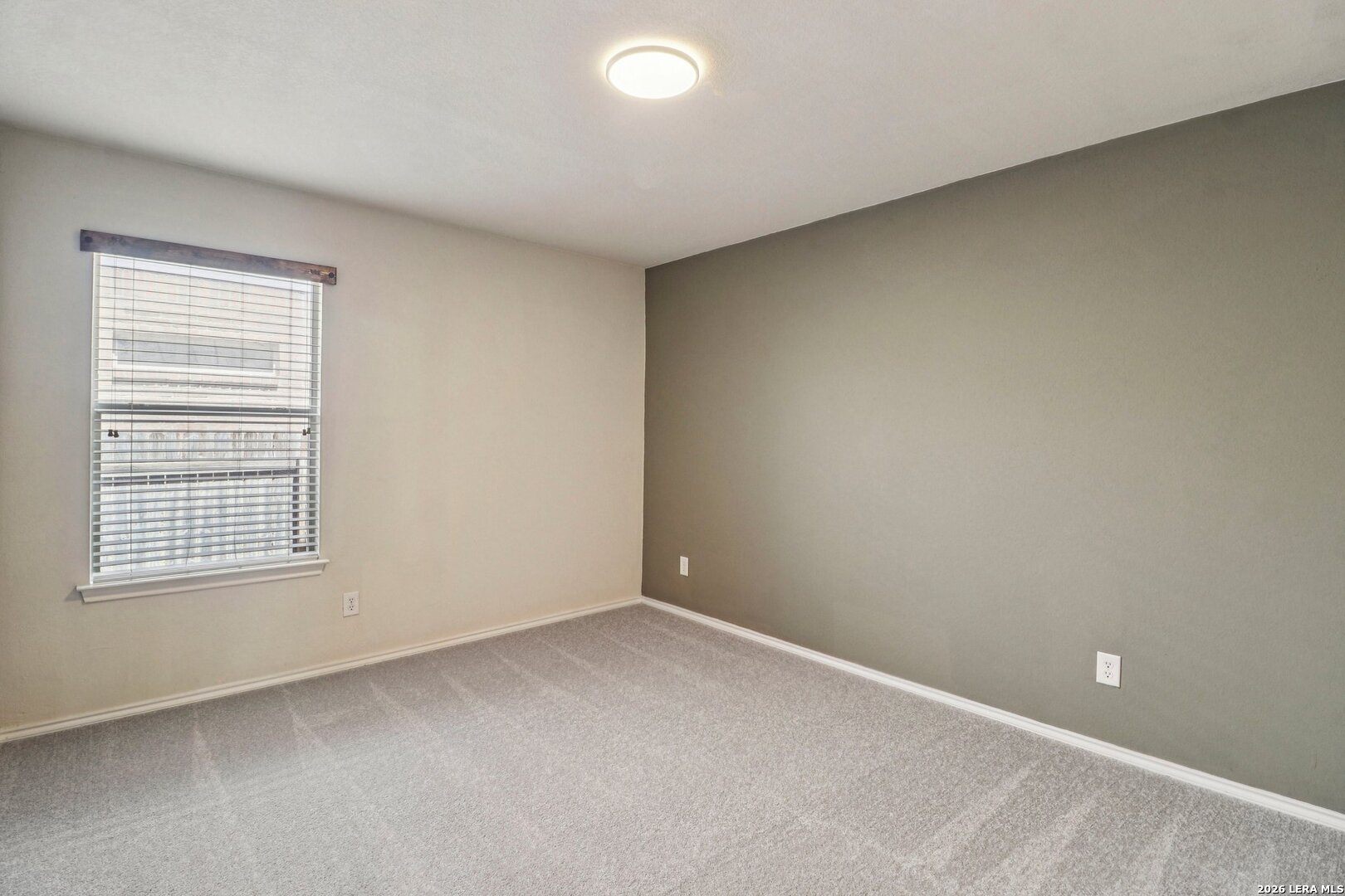 10723 Kobort Helotes, TX 78023 - Photo 20 of 36 an empty room with a window