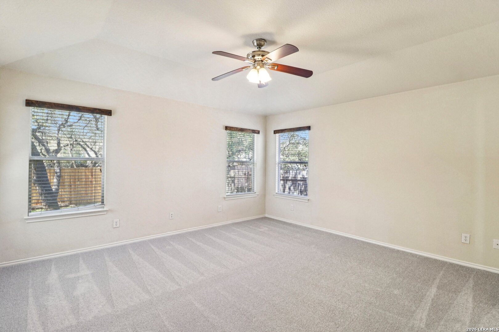 10723 Kobort Helotes, TX 78023 - Photo 22 of 36 a view of an empty room with a window