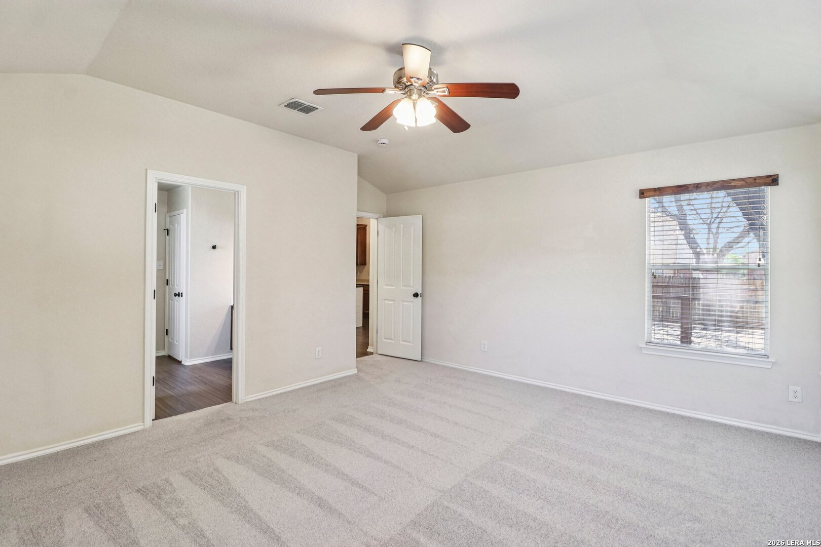 10723 Kobort Helotes, TX 78023 - Photo 23 of 36 a view of an empty room with a window