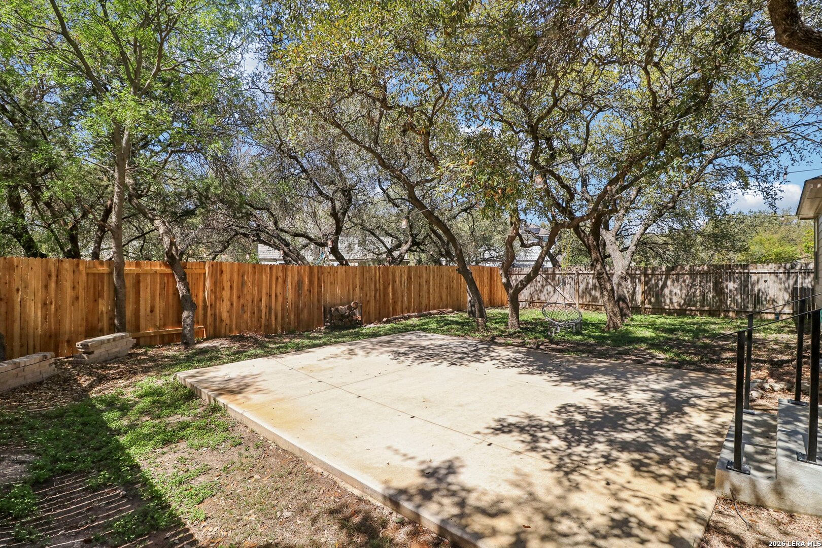 10723 Kobort Helotes, TX 78023 - Photo 32 of 36 a backyard of a house with lots of green space
