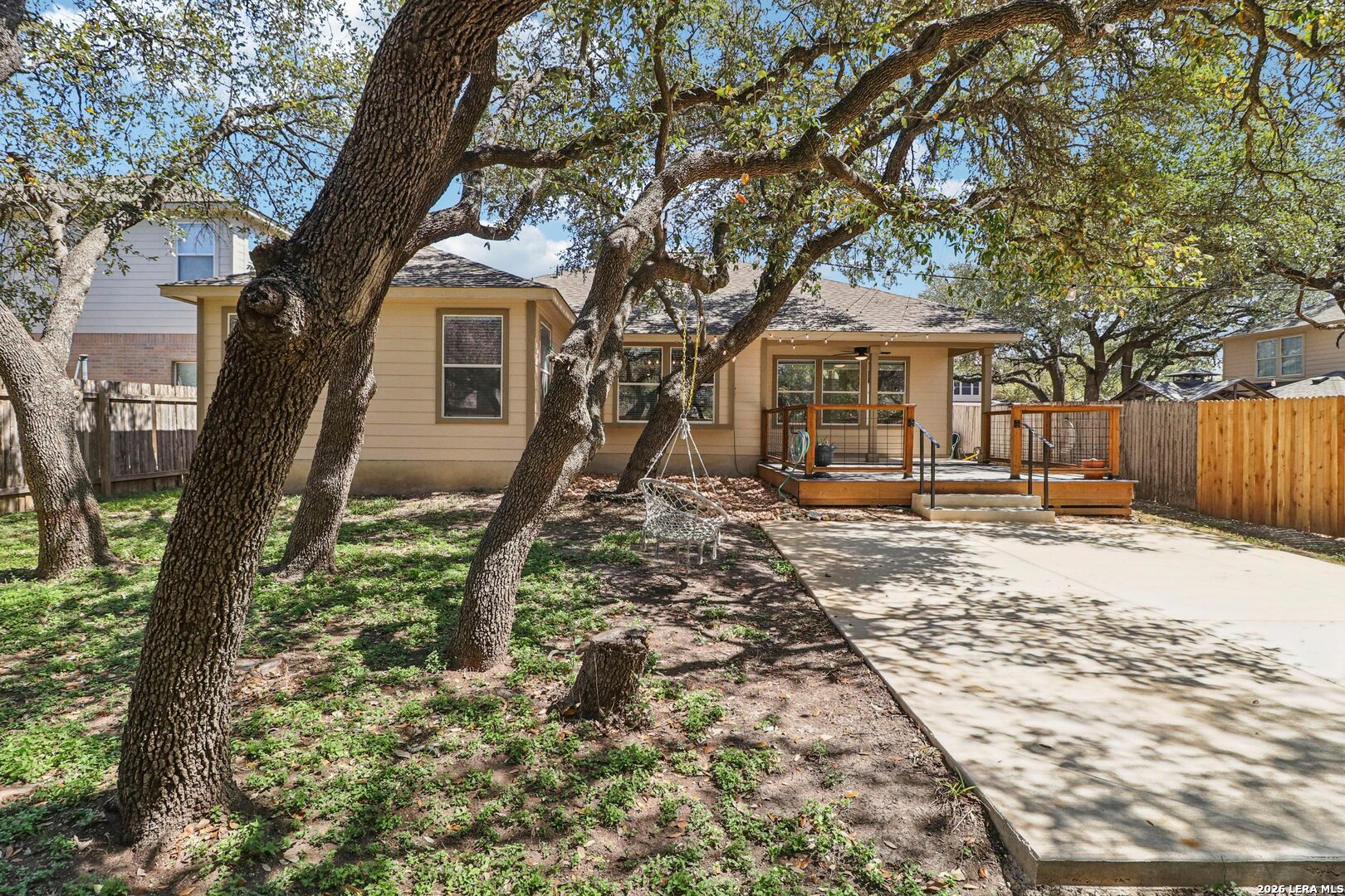 10723 Kobort Helotes, TX 78023 - Photo 33 of 36 a front view of a house with a yard covered in snow