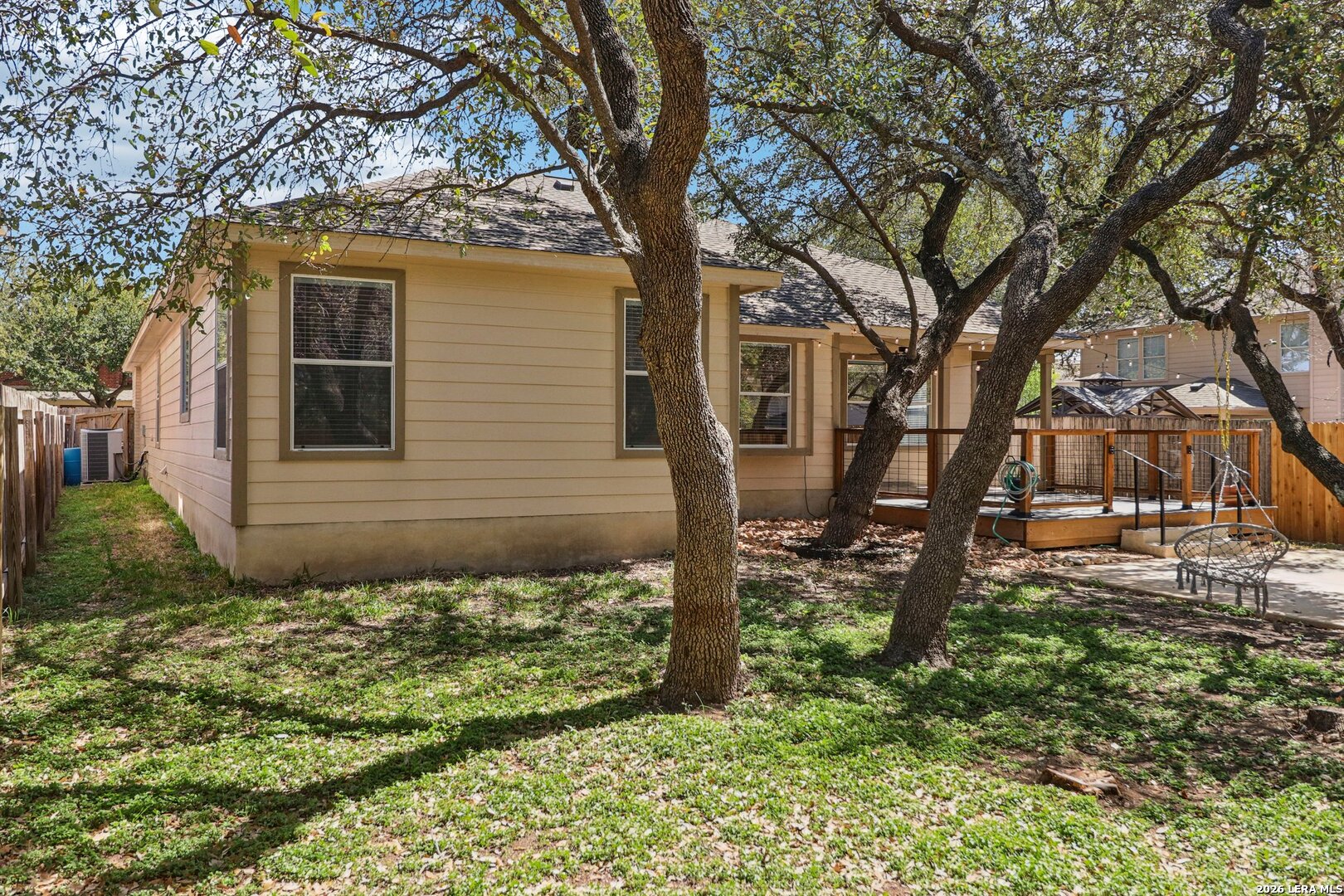 10723 Kobort Helotes, TX 78023 - Photo 35 of 36 a backyard of a house with lots of green space