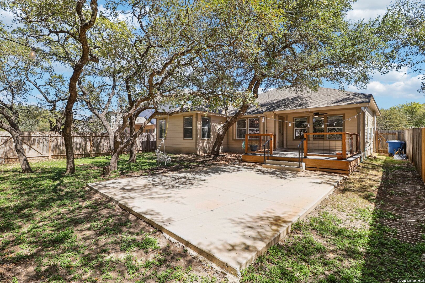 10723 Kobort Helotes, TX 78023 - Photo 5 of 36 front view of a house with a yard covered in snow
