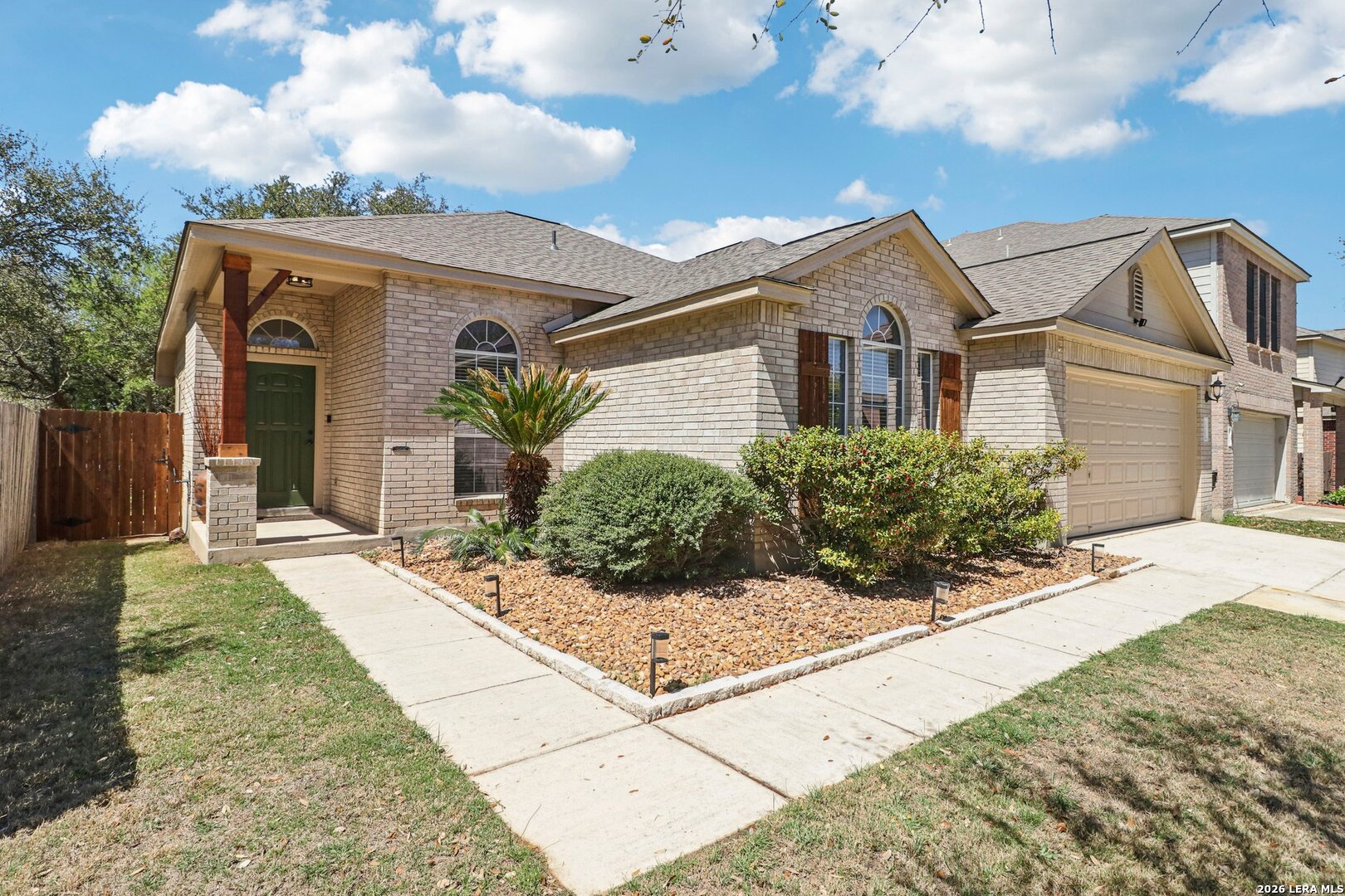 10723 Kobort Helotes, TX 78023 - Photo 10 of 36 a front view of a house with a yard