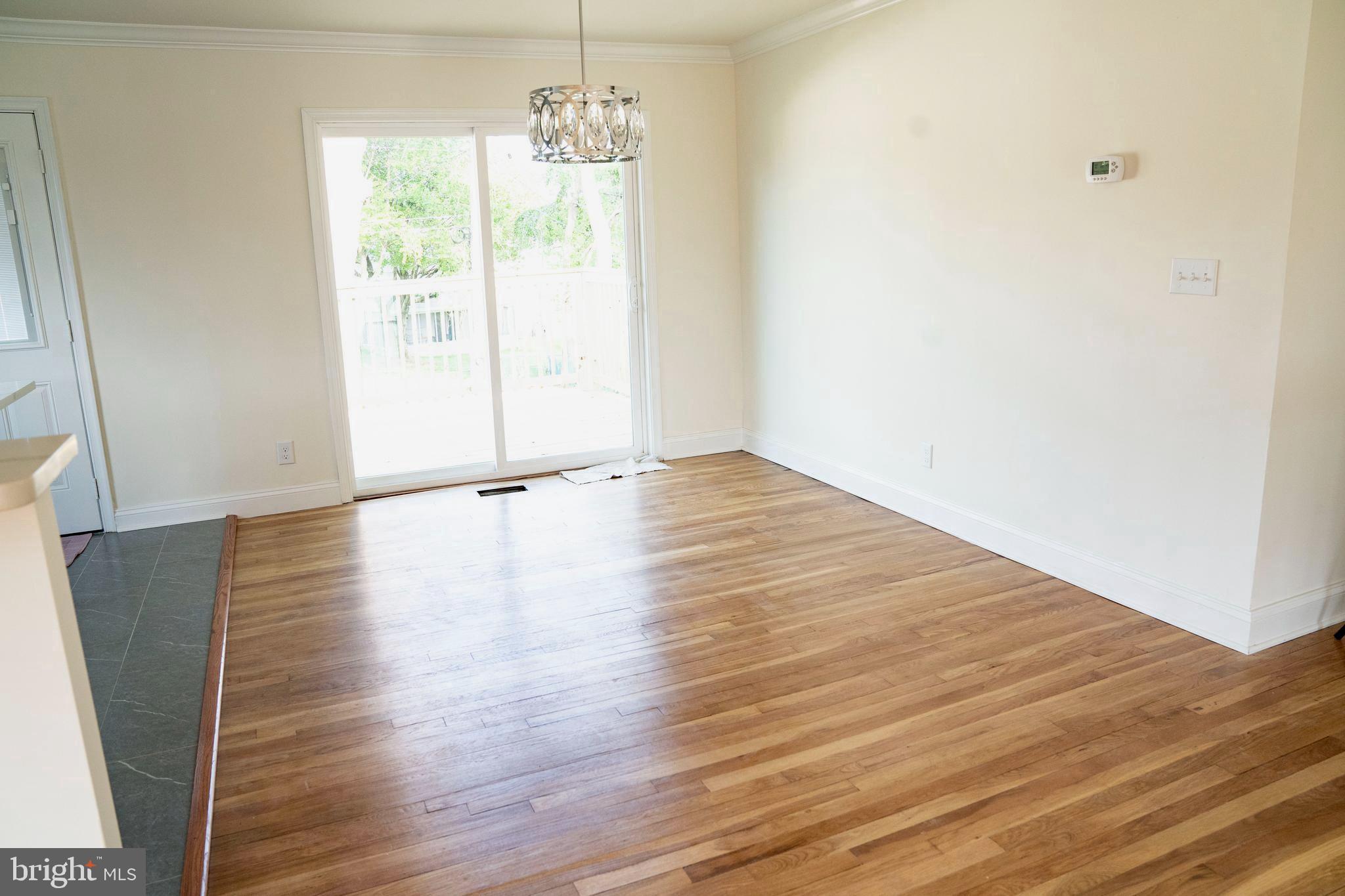 4003 Starbrook Road Randallstown, MD 21133 - Photo 6 of 29 Dining Room w/ entry to the deck