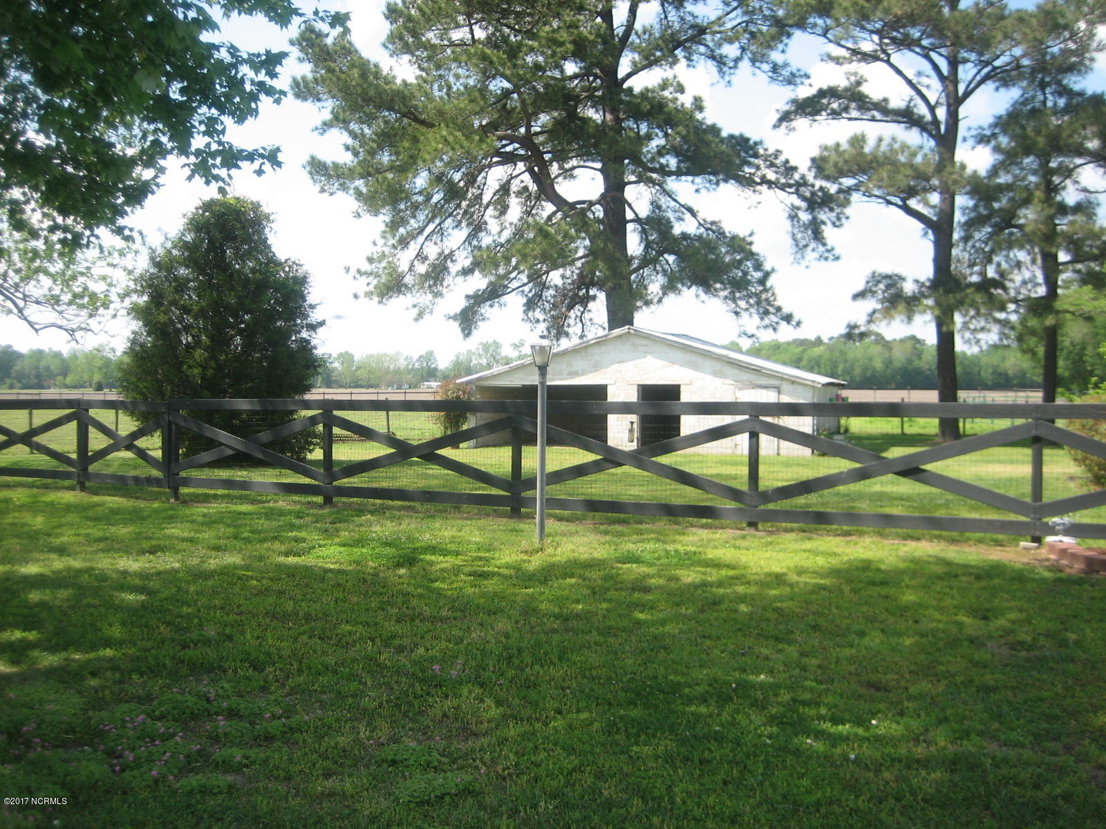 1094 Oak Grove Road Pollocksville, NC 28573 - Photo 7 of 32 Fenced Yard