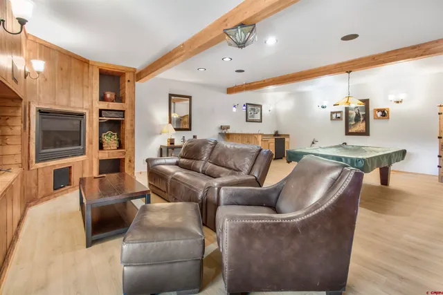 a view of kitchen with furniture and flat screen tv