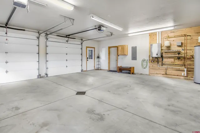 a bathroom with a mirror and a shower