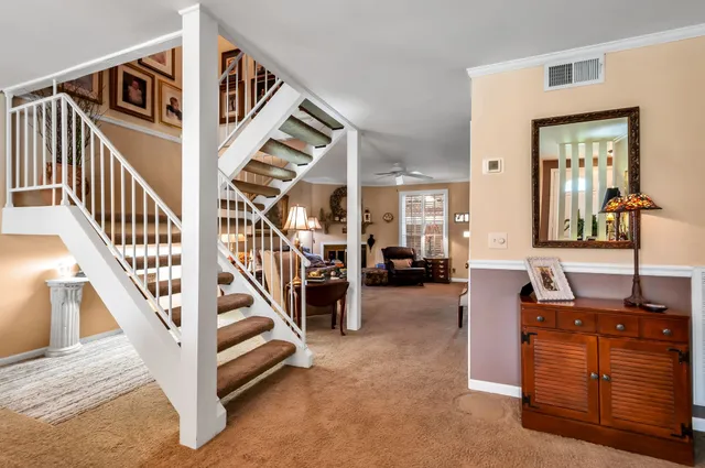 a view of entryway livingroom and hall