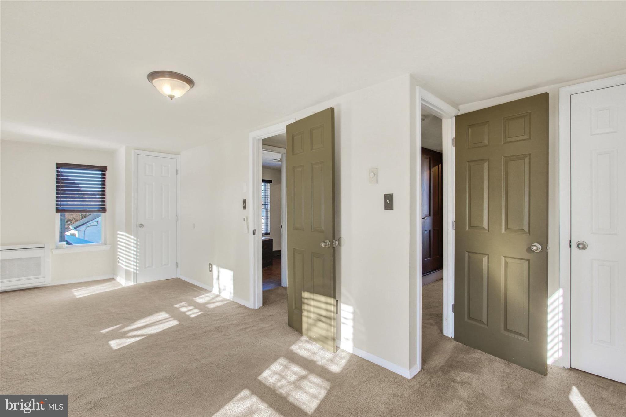 564 Blooming Grove Road Hanover, PA 17331 - Photo 17 of 27 a view of an empty room with window and bathroom