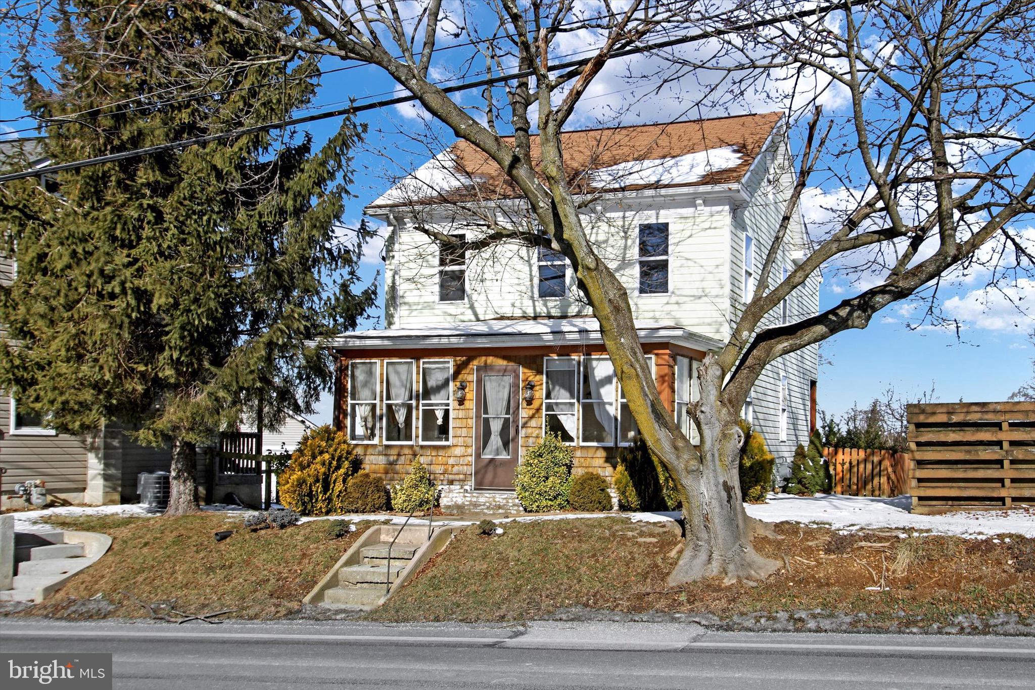 564 Blooming Grove Road Hanover, PA 17331 - Photo 2 of 27 a front view of a house with garden