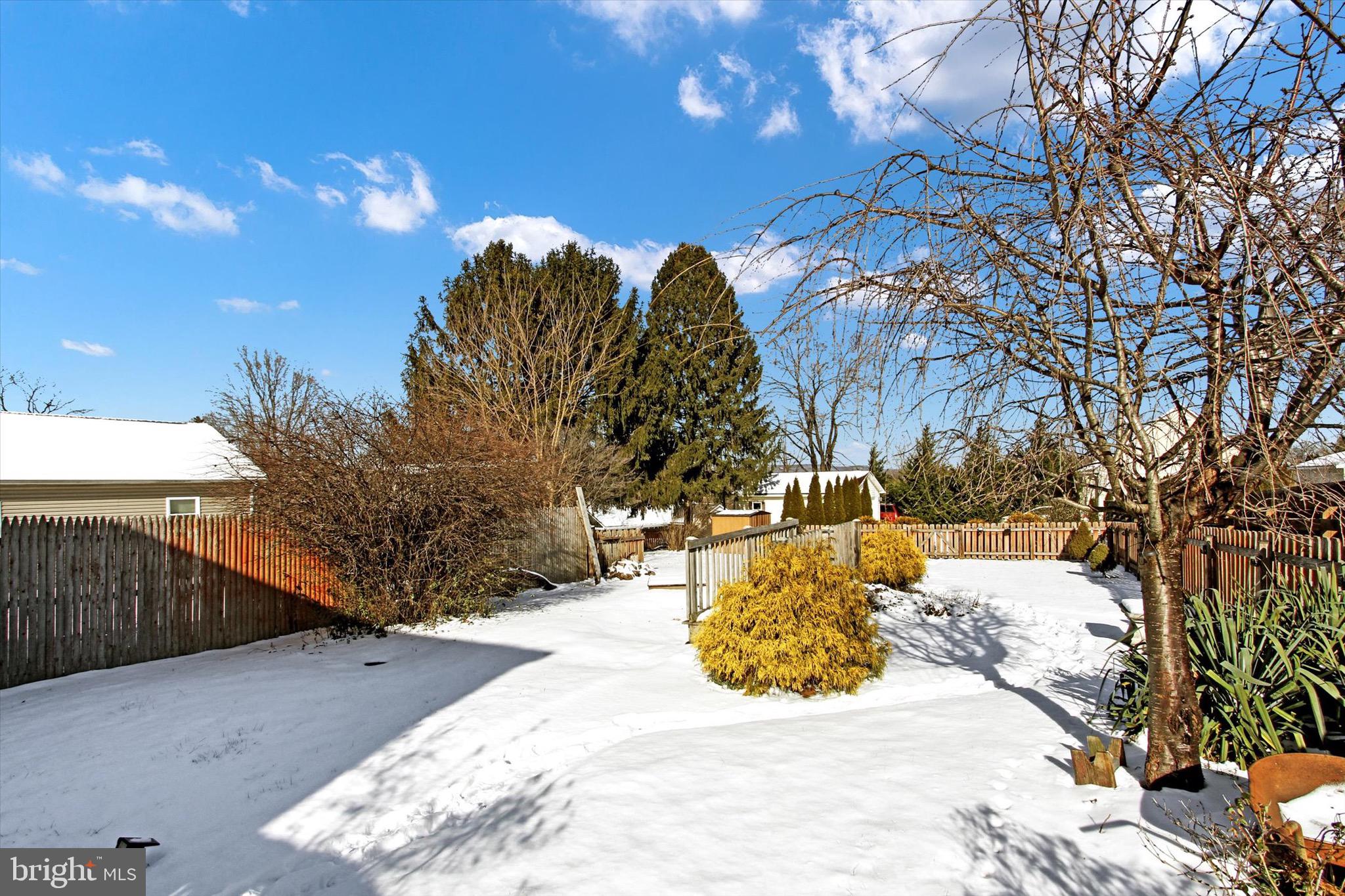 564 Blooming Grove Road Hanover, PA 17331 - Photo 25 of 27 a view of a yard with snow on the road