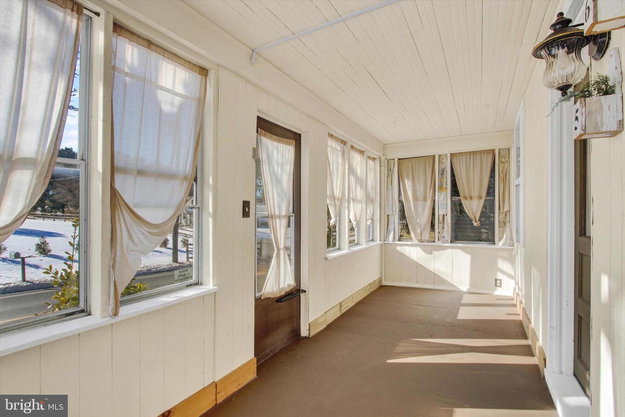 564 Blooming Grove Road Hanover, PA 17331 - Photo 3 of 27 a view of a hallway with windows and front door