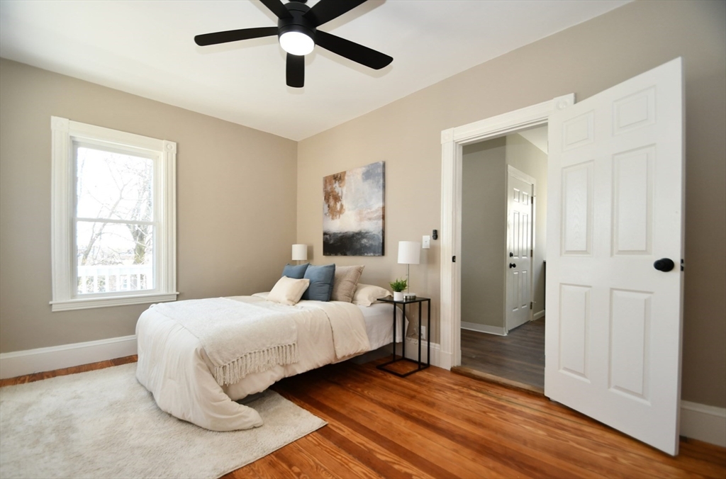 18 Lyon Street, Unit 2 Boston, MA 02122 - Photo 16 of 23 a bedroom with a bed and a window