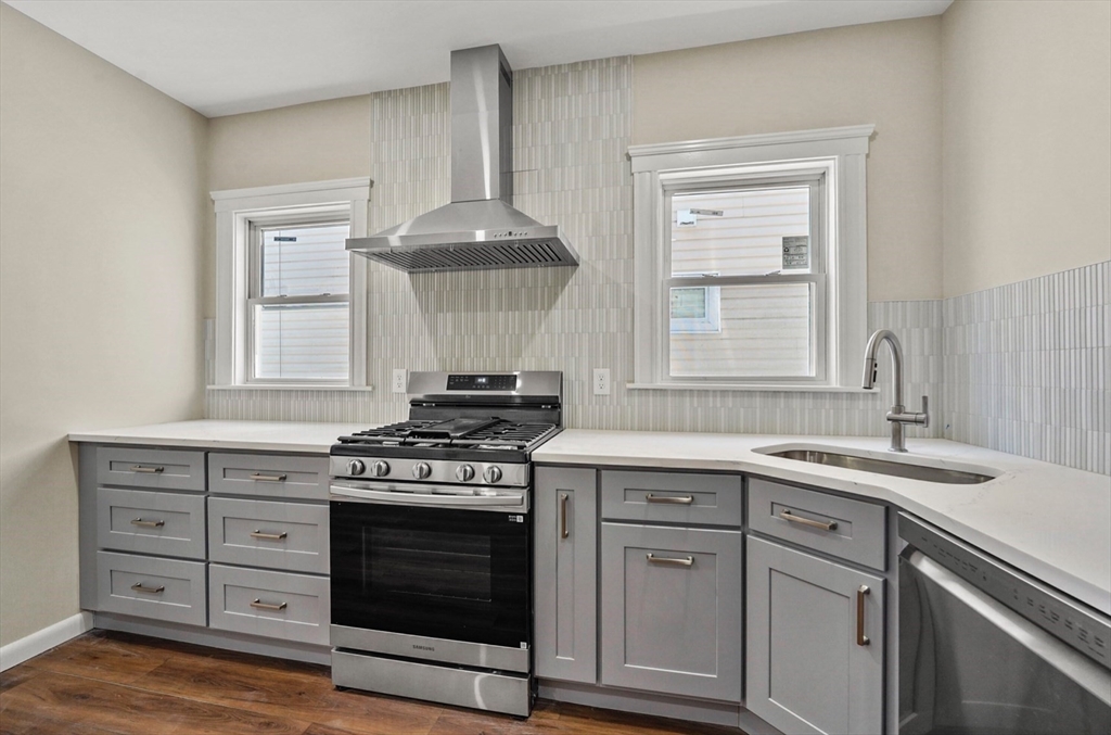 18 Lyon Street, Unit 2 Boston, MA 02122 - Photo 3 of 23 a kitchen with a stove oven and sink