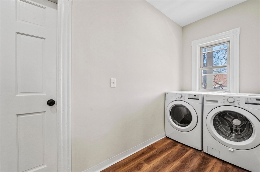 18 Lyon Street, Unit 2 Boston, MA 02122 - Photo 5 of 23 a utility room with dryer and washer