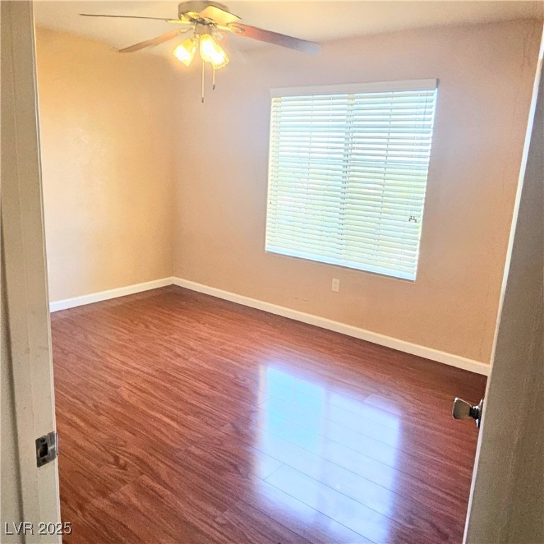 2120 Ramrod Avenue, Unit 1226 Henderson, NV 89014 - Photo 28 of 53 Spare room featuring wood finished floors and a ceiling fan
