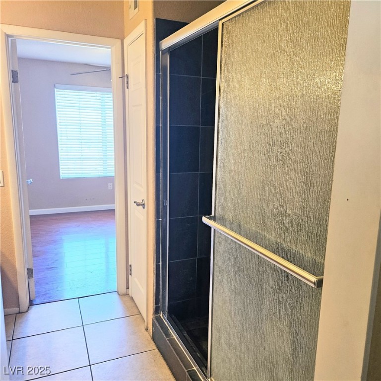 2120 Ramrod Avenue, Unit 1226 Henderson, NV 89014 - Photo 37 of 53 Full bathroom with tile patterned floors and a stall shower