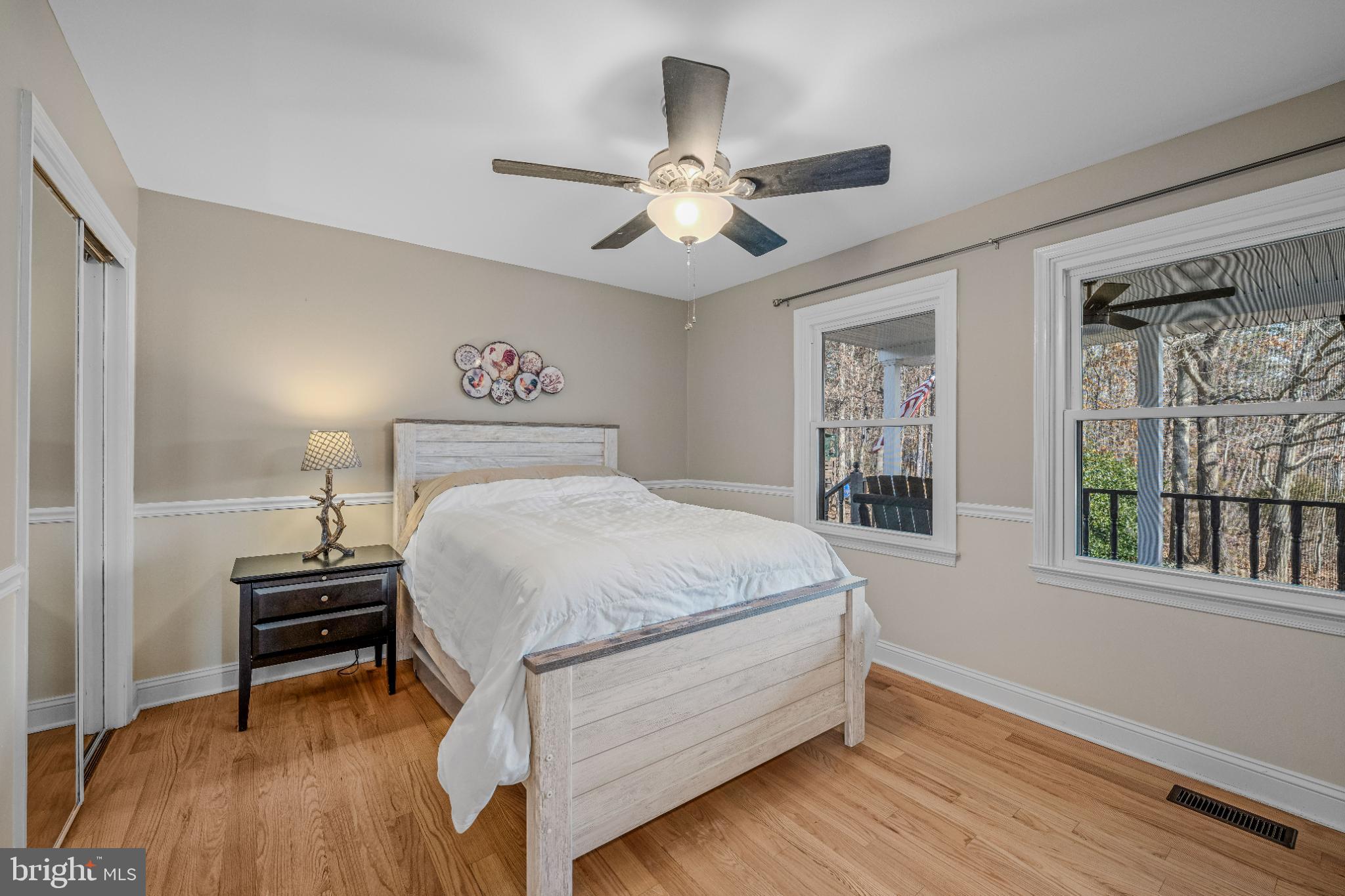 654 Soper Lane Berkeley Springs, WV 25411 - Photo 23 of 71 a bedroom with a bed and a window