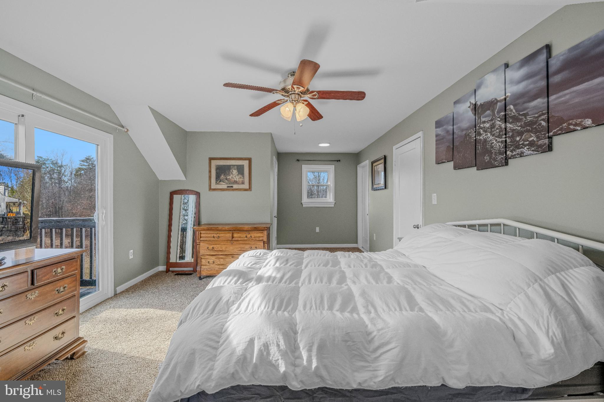 654 Soper Lane Berkeley Springs, WV 25411 - Photo 32 of 146 Serene bedroom with natural light and views.
