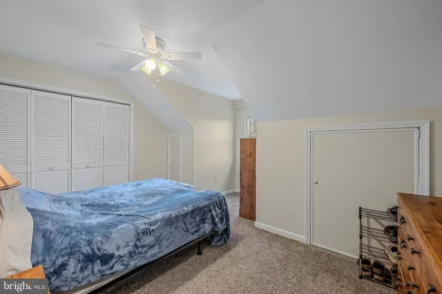 a view of a house with a yard covered with snow in the yard