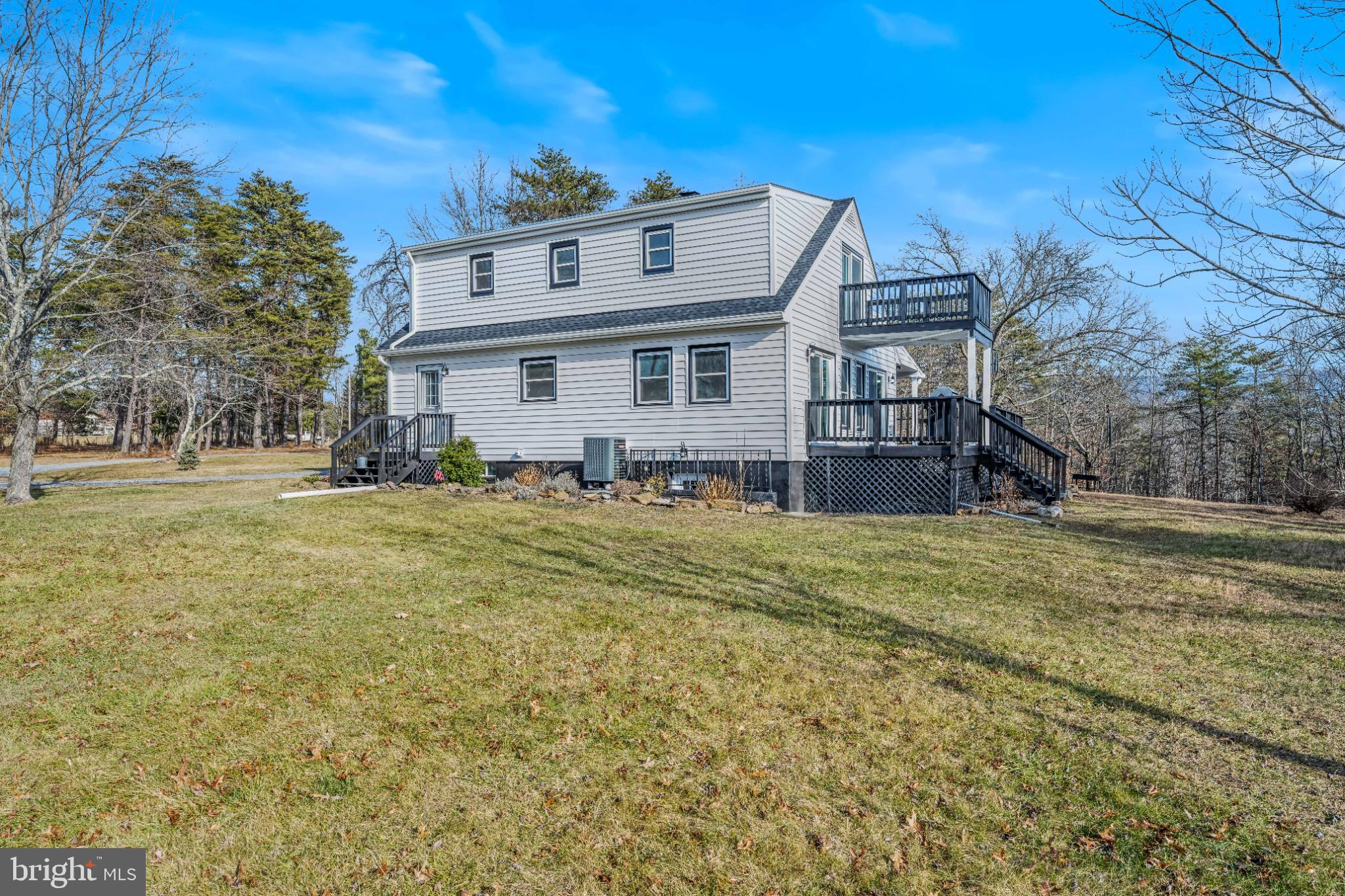 654 Soper Lane Berkeley Springs, WV 25411 - Photo 42 of 71 a view of a house with a big yard